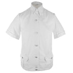 Front view of an unissued white East German police shirt with a buttoned placket, chest pockets, and shoulder epaulettes.