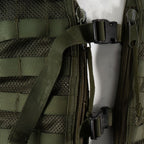 Close-up of the green front zippers and heavy-duty quick-release plastic buckles