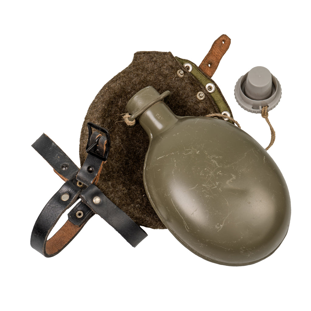 Genuine Czech M60 military canteen with olive drab aluminium bottle, insulating wool cover, and plastic cap.