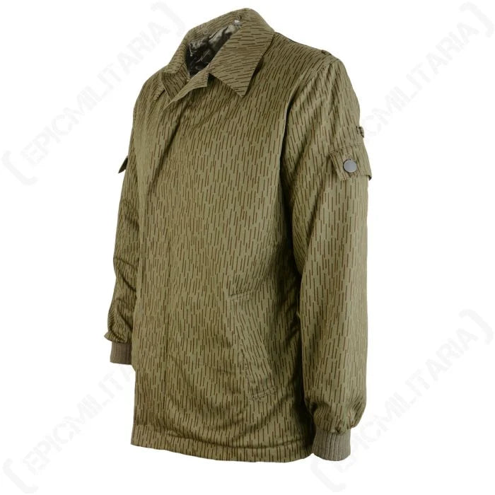 Three-quarter side view of DDR NVA Strichtarn padded winter coat with arm pocket