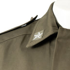 Close-up detail of the collar showing the embroidered Italian Army star insignia on the lapel.