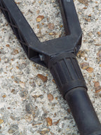 Close-up of the handle detailing the Gerber USA stamp on the black glass-filled nylon grip of the entrenching tool.