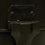 Close-up detail of the metal latch on an Italian Army mess tin clearly marked with OSIM 75, indicating Cold War era origin.