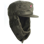 Austrian KAZ 75 field hat with chin strap fastened, showing the integrated hearing ports and secure fit for maximum warmth.