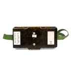 Top exterior lid of East German field telephone featuring phonetic alphabet metal plate