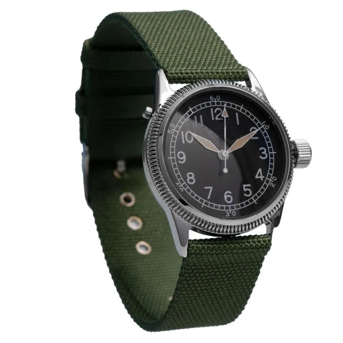 Angled side profile of US WW2 A-11 watch showing coin edge bezel and steel case
