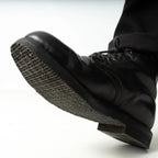 Close up of waffle grid rubber sole tread pattern on Austrian combat boot