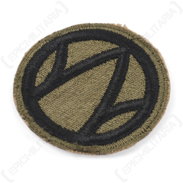 Angled view of original US Army 89th Infantry Division embroidered shoulder sleeve insignia