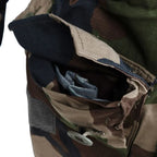 Detailed close-up of pocket flap and heavy-duty button on FELIN T4 jacket