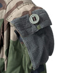 Close-up of Canadian-style button and hook-and-loop patch on French Army FELIN T4 sleeve pocket