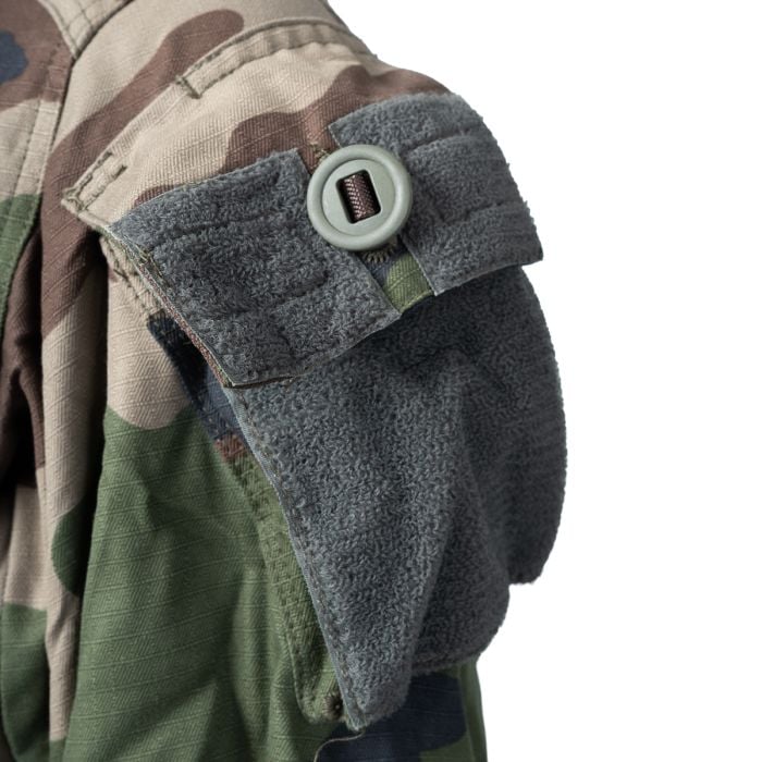Close-up of Canadian-style button and hook-and-loop patch on French Army FELIN T4 sleeve pocket