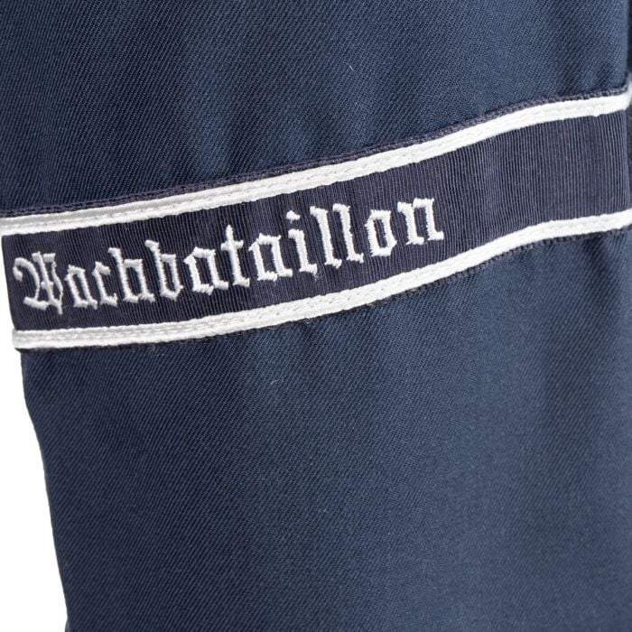 Detailed view of woven Gothic Wachbataillon cuff title embroidery on sleeve