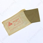 Unissued Czech Army triangular scarf partially pulled out of its original paper packaging with vintage red Czech markings.
