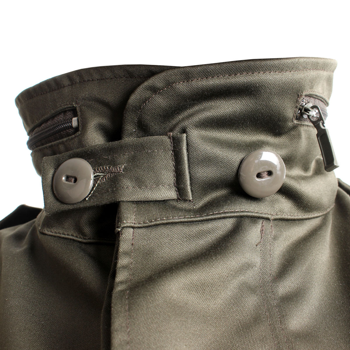 Detailed view of the collar and neck closure system with secure buttons for protection against cold alpine winds.