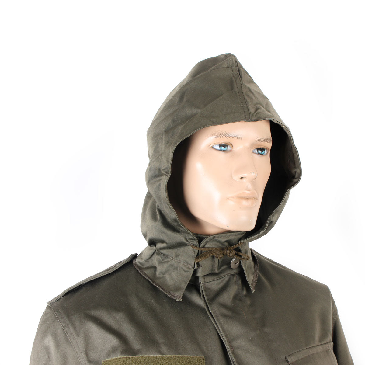Mannequin wearing the Austrian Army parka with the integrated hood deployed for rain protection.