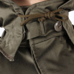 View of the collar area showing the integrated hood drawcord for a snug, heat-trapping fit.