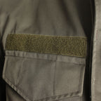 Close-up of the Velcro ID patch on the chest of the authentic Austrian olive drab field parka.