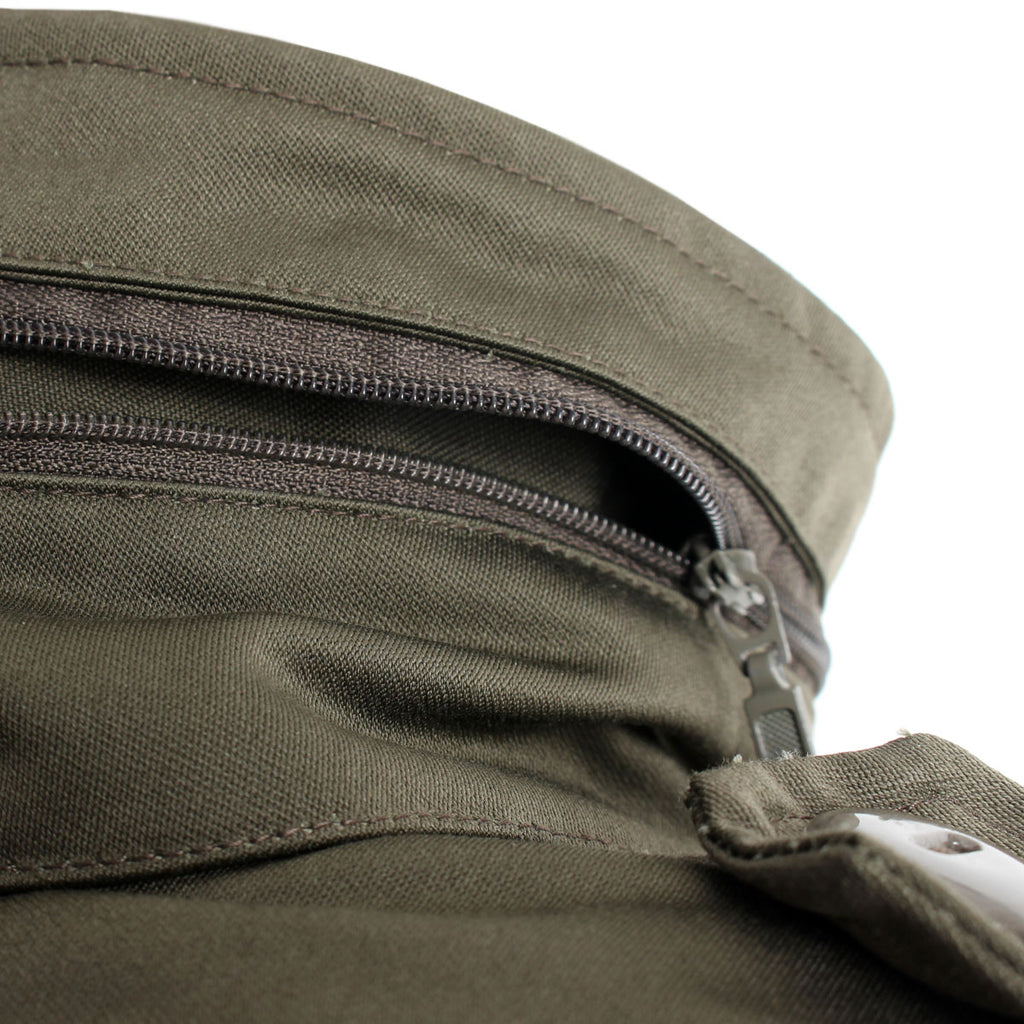 Close-up of the zippered compartment on the collar that hides the integrated stowaway hood.