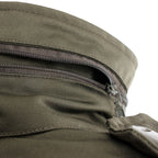 Close-up of the zippered compartment on the collar that hides the integrated stowaway hood.