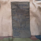 Internal military specification label from Leo Minor showing NNO registration and sizing diagram