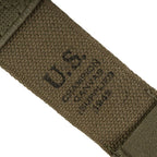 Close-up of the stenciled US stamp and Champion Canvas Supplies 1945 maker mark on the webbing.