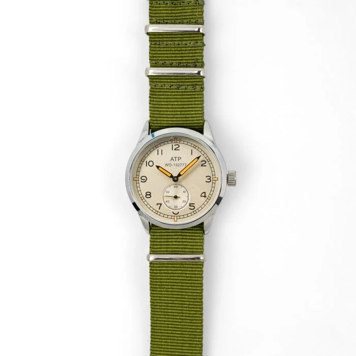 Full front vertical lay of the British ATP Service Watch with green strap