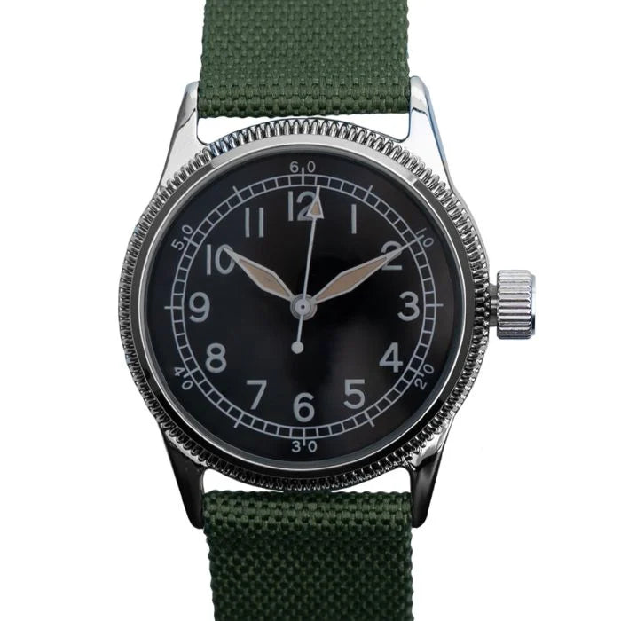 Front dial view of the US WW2 A-11 military service watch with olive green canvas strap