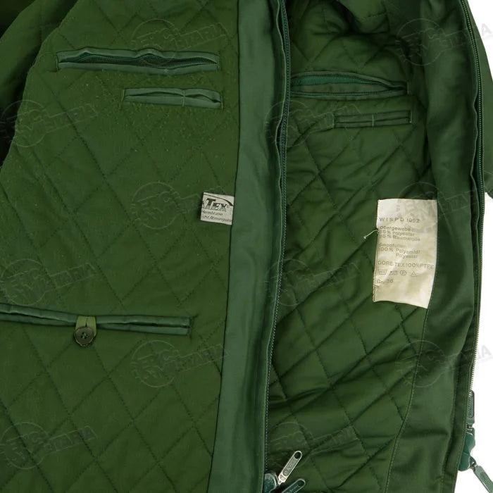 Close-up of internal zip pockets and specification label on liner