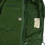 Close-up of internal zip pockets and specification label on liner