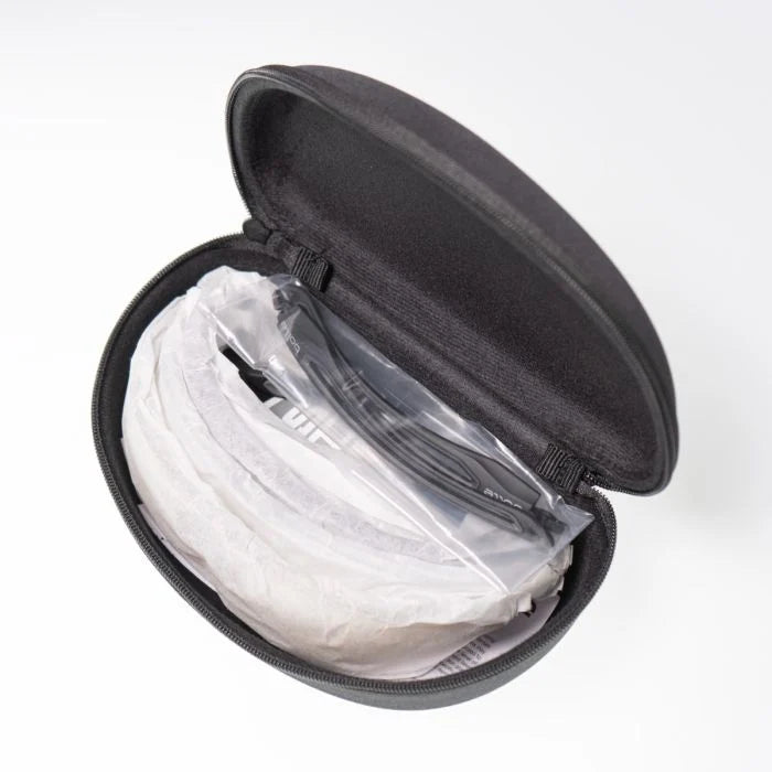 Open protective hard case containing packed Bollé Gunfire glasses and accessories