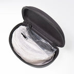 Open protective hard case containing packed Bollé Gunfire glasses and accessories