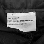 Internal view of British Army Black Day Sack showing main compartment drawcord closure