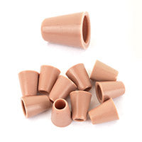 A close-up view of tan, bell-shaped cord end toggles, showing the durable surplus plastic design used for securing laces and drawstrings.