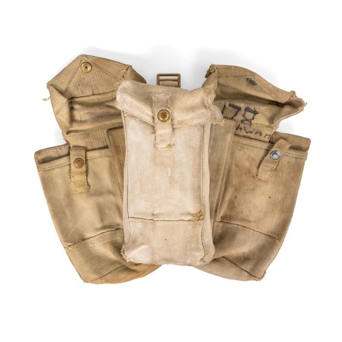 Collection of original WW2 British Army Mark III canvas ammo pouches featuring press stud closures and webbing straps.