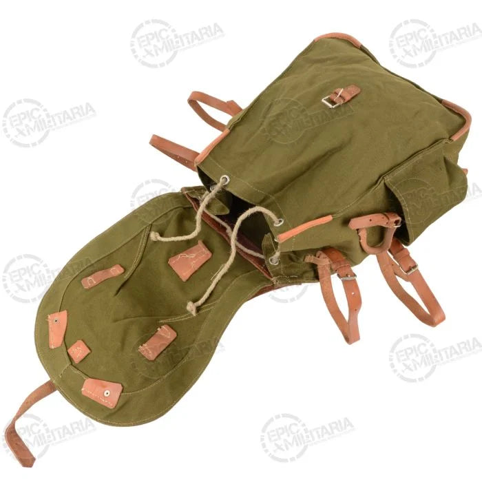 Inside view of the opened Romanian canvas backpack showing the drawstring rope and flap construction