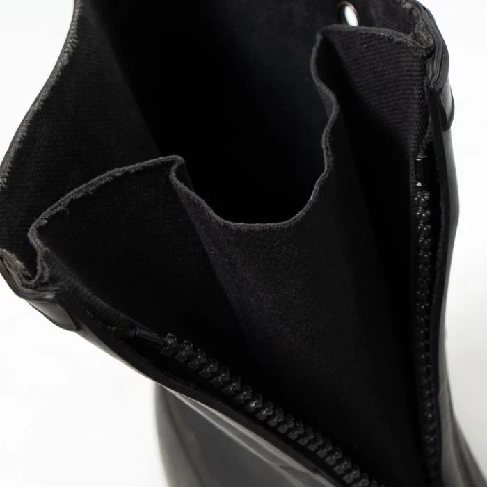 Close-up of the interior gusset behind the zipper of the German Army overshoe boot showing the watertight rubber seal.