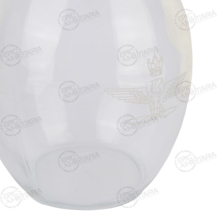 Close up of etched Italian Air Force crowned eagle emblem on glass carafe