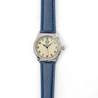 Full flat lay view of the British RAF 6B/159 pilot watch laid out vertically