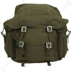 Close up of olive green Bundeswehr canvas pack showing main flap and metal friction buckles