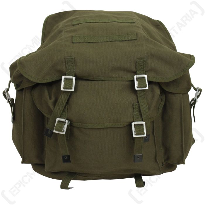 Close up of olive green Bundeswehr canvas pack showing main flap and metal friction buckles