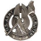 Front view of original silver US Army Recruiter Badge featuring eagle and torch emblem