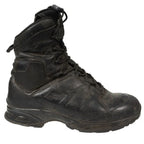 Lateral side view of the black leather Haix combat boot featuring the padded hexagonal ankle protection panel and high-ankle collar.