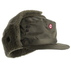 Original Austrian Army Winter Cap in olive drab with ear flaps folded up and embroidered cockade on front