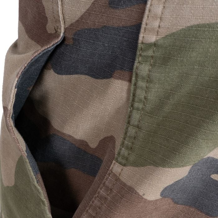 Close-up of slanted front hip pocket and ripstop fabric grid pattern