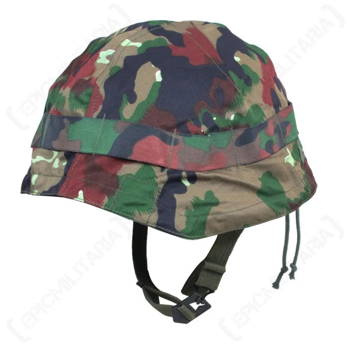 Original Swiss Army M71 helmet cover in Alpenflage camo mounted on a steel helmet showing foliage band