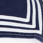Detail of the neat white stitching on the blue sailor collar stripes