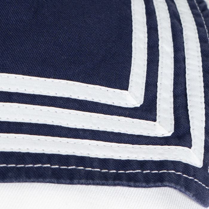 Detail of the neat white stitching on the blue sailor collar stripes