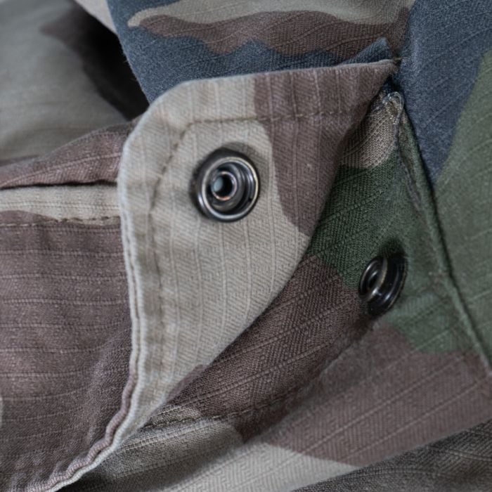 Close-up of elasticated ankle hem designed for high-leg combat boots