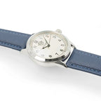 Angled profile view of the 37mm polished case, domed glass crystal, and ribbed crown