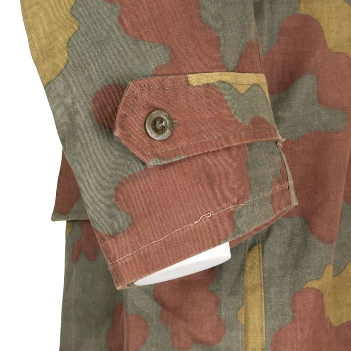 Detail view of the adjustable buttoned wrist cuff on the sleeve of the Italian San Marco coveralls